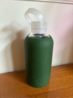 BKR bottle with green sleeve